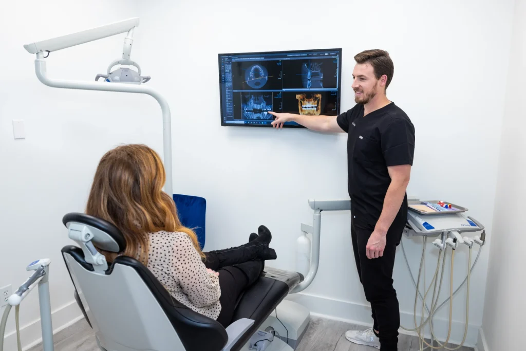 Dr. Morton helping a patient who needs a tooth extraction in Nashville, TN